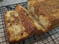 two pieces of bread sitting on top of a cooling rack