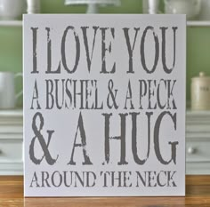 a sign that says i love you a bushel and a peck and a hug around the neck