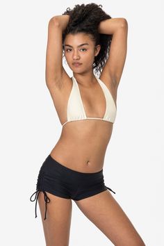 This ruched shorts feature spaghetti ties that allow you to scrunch the sides to your desired length with a low rise fit and thick waistband. These shorts are made of our matte nylon tricot, and are double-layered for full opacity and durability in or out of the water. Also suitable for the gym, dance and more. Mix and match with our bikini tops for the beach, or pair with your favorite crop top for everyday wear. Made in Los Angeles, Calif. Our experienced sewers earn up to $25 an hour and no l Ruched Shorts, Lace Knitwear, Gym Dance, Denim Short Jumpsuit, Kids Garments, Bad Kids, Tie Shorts, Long Sleeve Kids, Hair Women