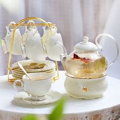 there is a tea set on the table