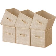 four linen storage bins with handles on each side and three smaller boxes in the middle