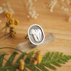 Simple statement signet-ring, all handmade from sterling silver. This ring is a split shank band decorated with a beautiful shadow box oval with a wild Bear silhouette. Oxidized and polished to add a more raw look and enchance the details. A great gift idea for romantics, magic and forest lovers. It will work well as your daily basis jewelry as well as an accessory to a party stylization. SIZE IS ADJUSTABLE, fits the best sizes 6,5-9,5 (US) / 12-20 (Europe) Materials: sterling silver; Silver wei Bear Ring, Wild Bear, Big Statement Rings, Silver Bear, Bear Silhouette, Split Shank, Mama Bear, Ring Finger, Adjustable Ring