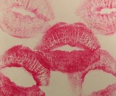 four different types of lipstick drawn in pink on white paper with red crayons