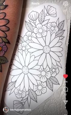 two tattoos with flowers on them, one is black and the other has white ink