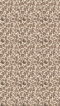 an animal print pattern with brown spots on it's skin, and the background is beige