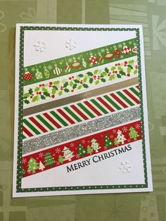 a christmas card with lots of ribbons on it