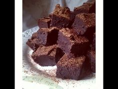 a plate full of brownies on a table