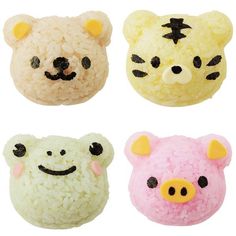 four different types of rice balls with faces on them in the shape of teddy bears