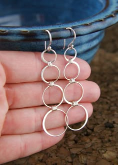 Long sterling silver circle earrings four by jersey608jewelry, $29.00 Silver Handmade Earrings, Modern Silver Jewelry, Silver Circle Earrings, Infinity Earrings, Aluminum Jewelry, Metal Clay Jewelry, Jewelry Design Inspiration, Silver Jewelry Design, Wire Work Jewelry