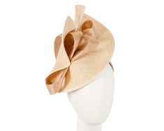 Large nude twisted plate decorated with silk abaca bow. Hand made in Melbourne by our skillful milliners, this headpiece will be a crown jewel of your spring racing outfit.   Made in Australia  Exclusive materials  Stylish design by Fillies Collection  Comfortable headband Elegant Spring Hair Accessories With Decorative Bow, Beige Headpiece For Kentucky Derby Event, Elegant Spring Headpiece With Ribbon, Adjustable Ribbon Fascinator For Kentucky Derby, Elegant Beige Headpiece For Events, Elegant Cream Headband For Spring, Elegant Ribbon Headband, Elegant Mini Hat With Bow For Kentucky Derby, Elegant Fitted Fascinator With Ribbon