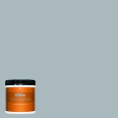 the behr paint color is shown in an orange and gray hue with black accents