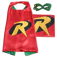 a child's cape and mask set with the word rr on it, in red