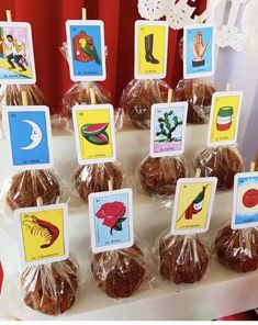 there are many desserts on the table for children to eat and have pictures on them