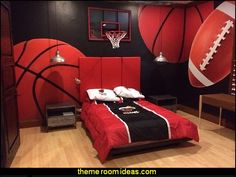 a basketball themed bedroom with red and black walls, wood flooring and a bed