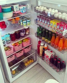 an open refrigerator filled with lots of food