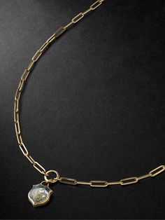 Foundrae's 'Classic Fob Clip Chain' necklace is handcrafted from 18-karat gold and has an annex link at the centre that's strung with a blue topaz 'Wholeness' pendant. The ouroboros, depicting a snake eating its own tail, is an ancient symbol of balance, unity and rejuvenation. Garnet Necklace Gold, Snake Eating, The Ouroboros, Gold Topaz, Mens Gold Jewelry, Topaz Pendant, White Gold Chains, Garnet Necklace, A Snake