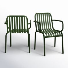 two green chairs sitting next to each other on a white surface and one is empty