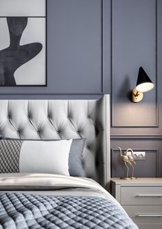 a bedroom with blue walls and white bedding, two nightstands and a painting on the wall