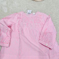 New J Crew Cuts Pink Striped Top With Ruffle And Smocked Neck New With Tags Excellent Condition Cotton Soft Fabric White Long-sleeve Top With Smocked Back, Pink Cotton Blouse With Smocked Back, White Long Sleeve Smocked Top, Pink Cotton Smock Blouse, Cute Pink Cotton Smocked Top, Pink Cotton Smock Top, Pink Smock Cotton Top, Cute Cotton Tops With Smocked Bodice, Long Sleeve Cotton Tops With Smocked Back