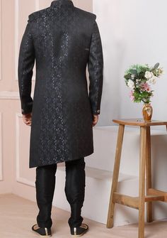 Ready-Made Sherwani With Trouser. Jacquard Brocade Fabric Top. Art Dupion Churidar Ready Made Trouser. Crafted in Chinese Collar Neck, and Full Sleeve. Satin Lining with Plain Work. High-Quality Matching Buttons. Please Note: The footwear shown in the picture is for presentation and photography purpose only. Color: There might be slight color variation due to lightings and flashes while photo shooting. The color may also vary because of different screen resolutions. Wash Care: Dry Clean Only. Fitted Nehru Jacket With Dupatta For Party, Fitted Traditional Wear For Formal Occasions, Fitted Formal Traditional Wear, Formal Fitted Traditional Wear For Diwali, Party Sherwani With Dabka On Straight Kurta, Party Sherwani With Dabka In Straight Kurta Style, Elegant Full Length Salwar Kameez For Eid, Fitted Traditional Suit With Traditional Drape, Formal Fitted Unstitched Suit With Traditional Drape