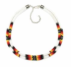 PRICES MAY VARY. Necklace drops approximately 17 inch from shoulder Each rope strand is 16-17 inch long, plus extension Native american inspired designs and colors Handmade using Czech seed beads size 11/0 Beautiful rope style beaded necklace handcrafted with traditional native american southwestern colors and patterns. The necklace features intricate beadwork in vibrant colors and is designed with two strands of beads that form a stylish rope-like pattern. The beads are carefully handwoven usin Southwestern Colors, Double Necklace, Native American Design, Bead Crochet Rope, Crochet Rope, Black Fire, Native Style, Rope Necklace, Bead Crochet