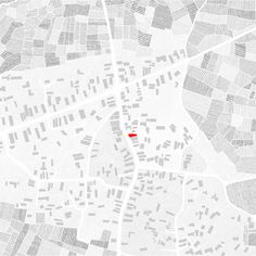 a red dot is in the middle of a white city map with lines and dots