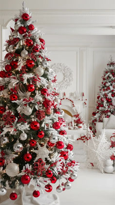 a christmas tree decorated with red and silver ornaments