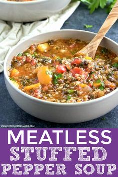 meatless stuffed pepper soup in a white bowl with a wooden spoon and parsley on the side