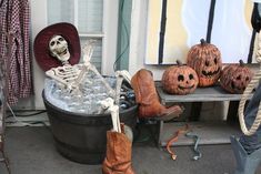 halloween decorations including boots and pumpkins are on display