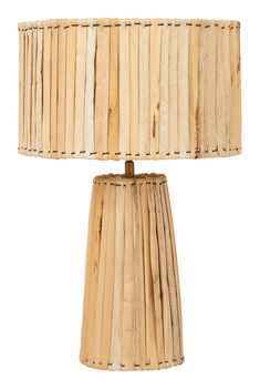 a lamp made out of wood sticks on a white background with a light shade over it