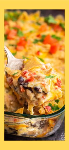 a casserole dish filled with chicken, black beans and veggies is being scooped from the casserole