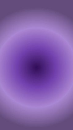 an abstract purple background with a circular shape in the center and light at the end