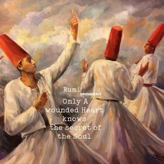 two men with red hats on their heads, one pointing to the sky while another man holds