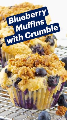 blueberry sour cream muffins with streuse are cooling on a rack