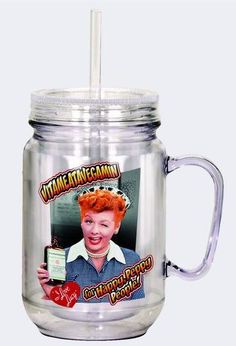 a glass jar with an image of a woman holding a drink in it's mouth