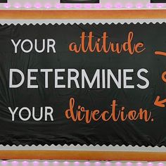 a sign that says your attitude determines your direction