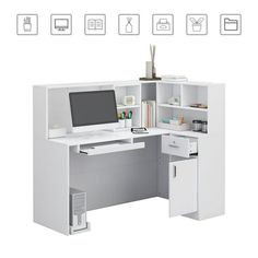 an office desk with a computer on top of it