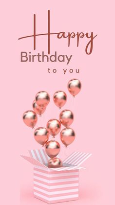 a pink birthday card with gold balloons in a box on top of a pink background