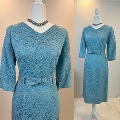 "Vintage 1950's Lace Bombshell / 1950s Dress / 50s dress / light blue lace floral dress / hourglass dress  Gorgeous blue lace floral over blue satin, with beautiful double bow belt. This beauty is so lovely. She has a hidden back metal zipper, and is fully lined for your comfort. Her belt has a double bow in the front and the buckle in the back  Measurements provided are flat and have been doubled. Bust 38\" Waist 26.5\" Hips 38\"  Length 41\" shoulders 14.5 belt 26-28\" ❤️ Condition: Excellent vintage condition. Flaw: one small faint stain on front bodice. Belt is slightly different color, possible color fade, but so minimal Please see pic. This item has been cleaned and is ready to wear. $148 includes domestic shipping and insurance. Please let me know if you have questions, would like m Vintage Blue Elegant Dresses For Formal Occasions, Elegant Blue Vintage Dress For Vintage Events, Elegant Fitted Light Blue Lace Dress, Vintage Light Blue Evening Dress, Formal Fitted Vintage Blue Dress, Vintage Blue Formal Vintage Dress, Vintage Blue Vintage Style Formal Dress, Vintage Fitted Lace Dress For Formal Occasions, Fitted Vintage Lace Dress For Formal Events