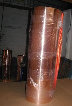 a large metal object wrapped in plastic