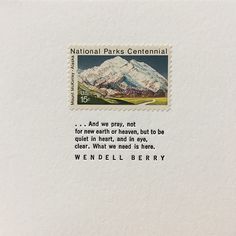 a postage stamp with an image of mountains and the words, national parks conteminal