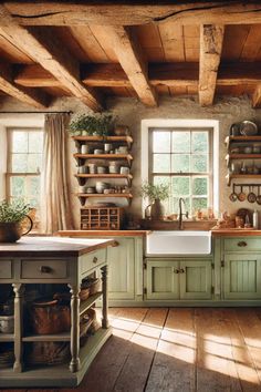 an old fashioned kitchen with green cabinets and wood flooring is pictured in this image