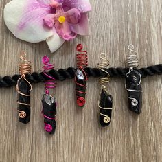 💥💥All colors are back in stock-pics updated!  This listing is for your choice of one dreadlock, braid, loc, or twist charm featuring a beautiful wire wrapped black quartz crystal.  Shown on copper, fuschia, red, gold, or silver wire  💥💥The coils shown are the ones you will receive. Please use the dropdown menu for your wire color choice.    Size: Opening is 8mm.  Made with 20g tarnish resistant wire.  Due to the variance in crystal sizes and shapes, new pieces will be added as sold.  All ite One Dreadlock, Gemstone Hair, Braids Boho, Dread Braids, Boho Locs, Unique Hair Accessories, Loc Jewelry, Black Quartz, Unique Hair