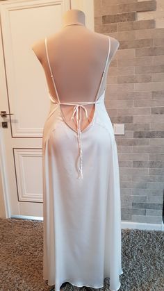 Pure natural silk or artificial silk/satin wedding camisole to add a perfect touch to your perfect and unique day. Only high quality fabrics and high finishing used for making the robe as neat as it can be. For more wedding robes, please access https://www.etsy.com/shop/LidiasBoutiqueDesign?ref=seller-platform-mcnav&section_id=25023222. For more wedding dresses, please access https://www.etsy.com/shop/LidiasBoutiqueDesign?ref=seller-platform-mcnav§ion_id=23157290. For more wedding tops and b Wedding Tops, Slip Dress Silk, Wedding Robes, Veil Styles, Wedding Skirt, Satin Camisole, Silk Nightgown, Bridal Robe, Wedding Robe