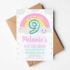 a birthday card with the number nine on it's front and rainbow in the background