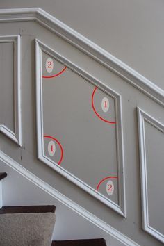 the stairs are marked with red numbers and numbered areas for each person to see in the mirror