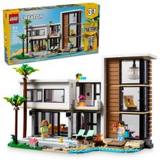 a lego set with a beach house and palm trees