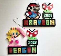 some type of ornament that is made out of perler beads and bead