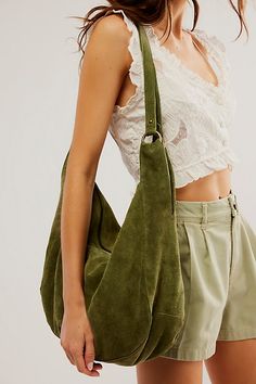 Effortlessly functional, this tote bag is featured in a slouchy hobo style with two elongated shoulder straps, all in soft suede fabrication with zipper closure for the perfect go-to bag. * Fully lined * Zipper closure * Fixed straps | Roma Suede Tote Bag by Free People in Green Slouchy Hobo Bag, Slouchy Tote, Suede Tote Bag, Slouchy Bag, Slouch Bags, Fall Bags, Suede Purse, Slouchy Style, Suede Tote