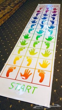 a sign that says start with hand prints on it